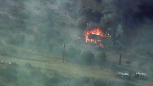 A home in Baldy Mesa goes up in flames in the North Fire on July 17, 2015. (Credit: KTLA)