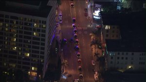 Dozens of law enforcement vehicles are seen on Sunset Boulevard after large crowds gathering for a free Future concert prompted a closure in front of West Hollywood's House of Blues on July 23, 2015. (Credit: KTLA) 