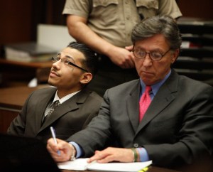 Pedro Espinoza, left, reacts after the jury announce their verdict on May 9, 2012, in Los Angeles. Espinoza was found guilty of first-degree murder for the fatal shooting of high-school football player Jamiel Shaw Jr., in 2008. (Credit: Barbara Davidson-Pool/Getty Images)