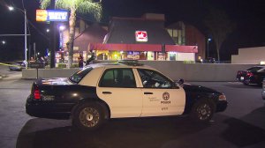 A Jack in the Box employee was injured after being shot during a robbery in the San Fernando Valley on July 12, 2015. (Credit: KTLA)