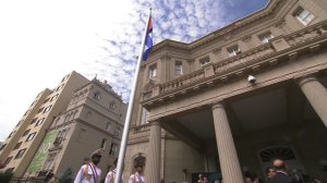 The Cuban flagged is raised over the new Cuban embassy in Washington, D.C., on July 20, 2015. (Credit: pool/CNN)