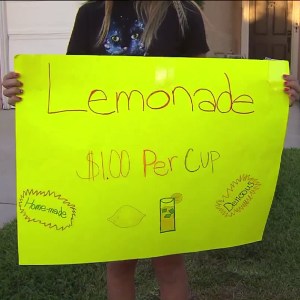  A photo shows the sign the girls were using for their lemonade stand in the area of Mountain View Street and Terra Vista Avenue. (Credit: KTLA)