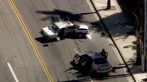 Police remained at the scene of a crash in Santa Ana on Aug. 3, 2015. (Credit: KTLA)