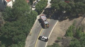 Police and firefighters responded to three small fires in Beverly Glen on Aug. 27, 2015. (Credit: KTLA)