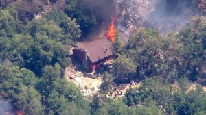 At least one structure burned in the Cabin Fire on Aug. 14, 2015. (Credit: KTLA)