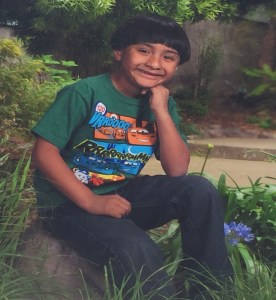 Jessie Rosales, is shown in a photo placed at a memorial. He died after an Aug. 6, 2015, crash in Orange. 