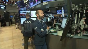 Traders work on the floor of the New York Stock Exchange as the closing bell nears on Aug. 21, 2015. (Credit: CNN)