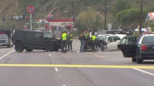 Authorities respond to the scene of a Feb. 7, 2015, crash on PCH in Malibu involving Caitlyn Jenner. (Credit: KTLA)