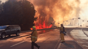 Firefighters battle a blaze in Montebello on Aug. 16, 2015. (Credit: Kirk Hawkins/KTLA)