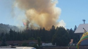 Cal Fire tweeted this photo of a brush fire burning near Snow Summit Ski Resort on Aug. 23, 2015. 