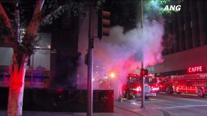 Firefighters responded to an underground explosion and fire Thursday night at a 19-story high-rise building in downtown Los Angeles on Aug. 20, 2015. (Credit: ANG News)