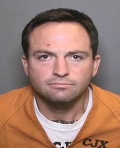 Craig Tanber, 37, is shown in a booking photo released by the Orange County Sheriff's Department on Sept. 11, 2015.