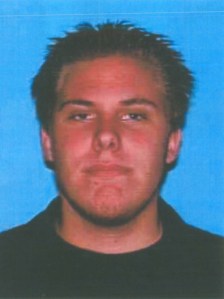 Brett Alan Usher is shown in a DMV photo for a license issued in 2011.