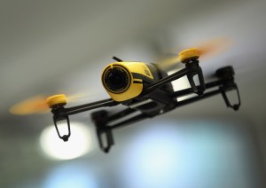 A Parrot Bebop quadcopter drone flies at the Parrot stand at the 2015 IFA consumer electronics and appliances trade fair on September 4, 2015 in Berlin, Germany. (Credit: Sean Gallup/Getty Images) 