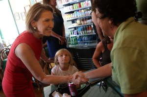 Republican presidential candidate Carly Fiorina greets patrons at the Starboard Market before eating lunch at the restaurant on Friday, Aug. 14, 2015, in Clear Lake, Iowa. (Credit: Win McNamee/Getty Images)