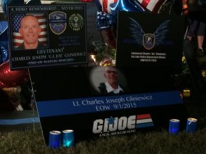 Residents and fellow police officers gather at the Fox Lake, Illinois, Police Department on Sept.2, 2015, to remember the life of Lt. Joe Gliniewicz. (Credit: Jack Hannah/CNN)