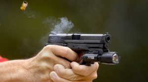 A Smith & Wesson M&P is fired on the range at the Pitchess Detention Center in Castaic. (Credit: Mark Boster / Los Angeles Times)