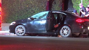 A car is seen after being shot at on Sept. 4, 2015, in South L.A. One person died as a result of the incident, according to LAPD. (Credit: OnScene) 