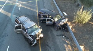 Two vehicles had severe damage after a pursuit and wrong-way crash on the 215 Freeway below the Cajon Pass on Sept. 18, 2015. (Credit: KTLA)