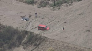 Vehicles were stuck in mudflows in the Lake Hughes area on Oct. 15, 2015. (Credit: KTLA)