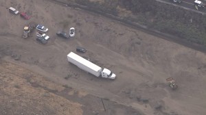 Vehicles were stranded in mud-blocked lanes of the southbound 5 Freeway north of Lebec on Oct. 15, 2015. (Credit: KTLA)
