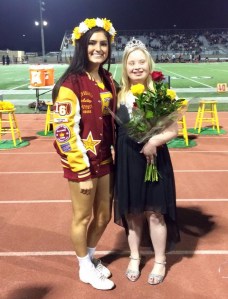 April Clark, right, is seen with an unidentified Esperanza High School classmate after being named homecoming queen on Friday, Oct. 16, 2015. (Credit: Laura R. Scott)