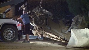 An SUV was pulled out of a 12 foot deep drainage ditch in Palmdale on Oct. 20, 2015. (Credit: KTLA)