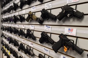 Handguns are displayed at the Ultimate Defense Firing Range and Training Center in St. Peters, Missouri, in November 2014. (Credit: JEWEL SAMAD/AFP/Getty Images)