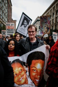 Director Quentin Tarantino attends a protest to denounce police brutality in Manhattan Oct. 24, 2015. The rally was part of a three-day demonstration against officer-involved abuse and killing. (Credit: Kena Betancur/Getty Images)