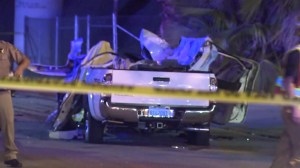 The occupants of a white Toyota Tacoma pickup truck were killed in a violent crash in Hacienda Heights on Oct. 18, 2015. (Credit: KTLA)