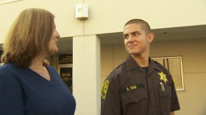 Robert Ram looks at his mother on Oct. 23, 2015, the day he graduated from OCSD Correctional Services Assistant Academy. (Credit: KTLA)