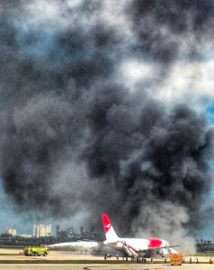 A Boeing 767 caught fire while taxiing for departure at Fort Lauderdale-Hollywood International Airport in Florida on Oct. 29, 2015. (Credit: Chris Dick)