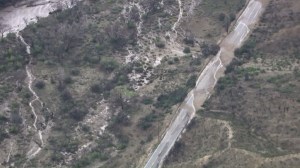A road near Lake Hughes was inundated with mudflows on Oct. 15, 2015. (Credit: KTLA)