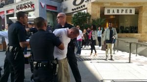 A witness captured this image of a man in custody after a stabbing at Hollywood & Highland on Nov. 18, 2015. (Credit: Shawn Walker)