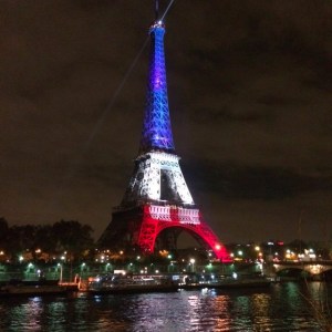 As Paris mourns after the terrorist attacks, the Eiffel Tower was lit up Monday evening in France's tricolor. (Credit: Karin Caifa/CNN)