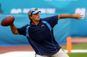 Former NFL quarterback Doug Flutie throws a ball before a game on November 17, 2013. (Credit: Streeter Lecka/Getty Images)