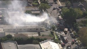 City firefighters were battling a blaze at an apartment building in South L.A. on Nov. 10, 2015. (Credit: KTLA)