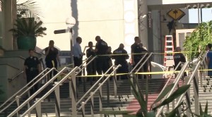 Police investigate near the spot where a person was stabbed at Hollywood & Highland on Nov. 18, 2015. (Credit: KTLA)