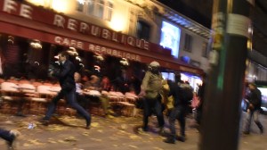 People run after hearing what is believed to be explosions or gun shots near Place de la Republique square in Paris on November 13, 2015. At least 18 people were killed in several shootings and explosions in Paris today, police said. (Credit: Getty Images)