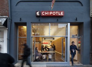 A exterior image of the Chipotle Mexican Grill located in the Chelsea neighborhood of New York City. (Credit: Chipotle)