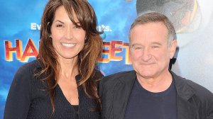 Robin and Susan Williams are seen at the premiere of Happy Feet. (Credit: KTLA)