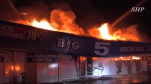 A fire is seen at a Torrance Big 5 Sporting Goods store on Dec. 10, 2015. (Credit: SHP)