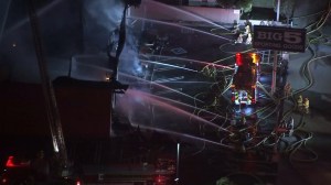 Firefighters battle a blaze at a Torrance-area Big 5 Sporting Goods store on Dec. 10, 2015. (Credit: KTLA)