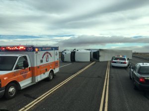 An overturned big rig is seen in lanes in the Mojave area on Dec. 22, 2015. (Credit: Brandon Vaccaro/California City Fire Rescue)