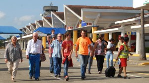 Passengers walk at Moi International Airport in Mombasa as their Air France flight from Mauritius to Paris was grounded after a suspected bomb was found on board on Dec. 20, 2015. (Credit: AFP/Getty Images) 