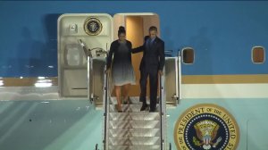 President Barack Obama and first lady Michelle Obama disembark from Air Force One at San Bernardino International Airport on Dec. 18, 2015. (Credit: Pool)