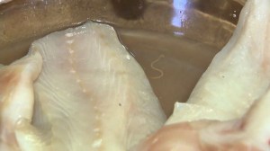 The Rock family says they found recently found a parasite in a package of fish purchased from a Northern California Costco store. (Credit: KCRA via CNN)