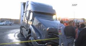 A big rig crashed with a passenger car in Gardena on Dec. 23, 2015, leaving one person dead. (Credit: Street Heat Productions)