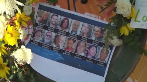 All 14 victims of a deadly mass shooting in San Bernardino on Dec. 2, 2015, are pictured at a memorial. (Credit: KTLA)