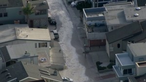 A Ventura street was flooded amid high surf along the coast on Dec. 11, 2015. (Credit: KTLA) 